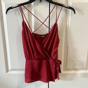 Brand New double spaghetti strapped wrap around tie at waist.  Rust colored